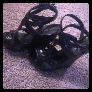 Double buckle patent leather wedges